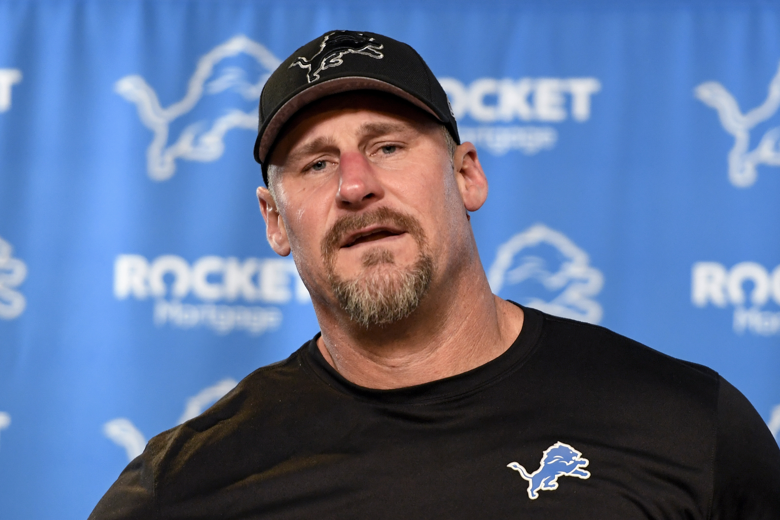 FILE - Detroit Lions head coach Dan Campbell talks to reporters following an NFL football NFC divisional playoff game against the Tampa Bay Buccaneers, Sunday, Jan. 21, 2024, in Detroit. With the franchise coming off its best season in 32 years, the Detroit Lions have extended the contracts of coach Dan Campbell and general manager Brad Holmes through the 2027 season.