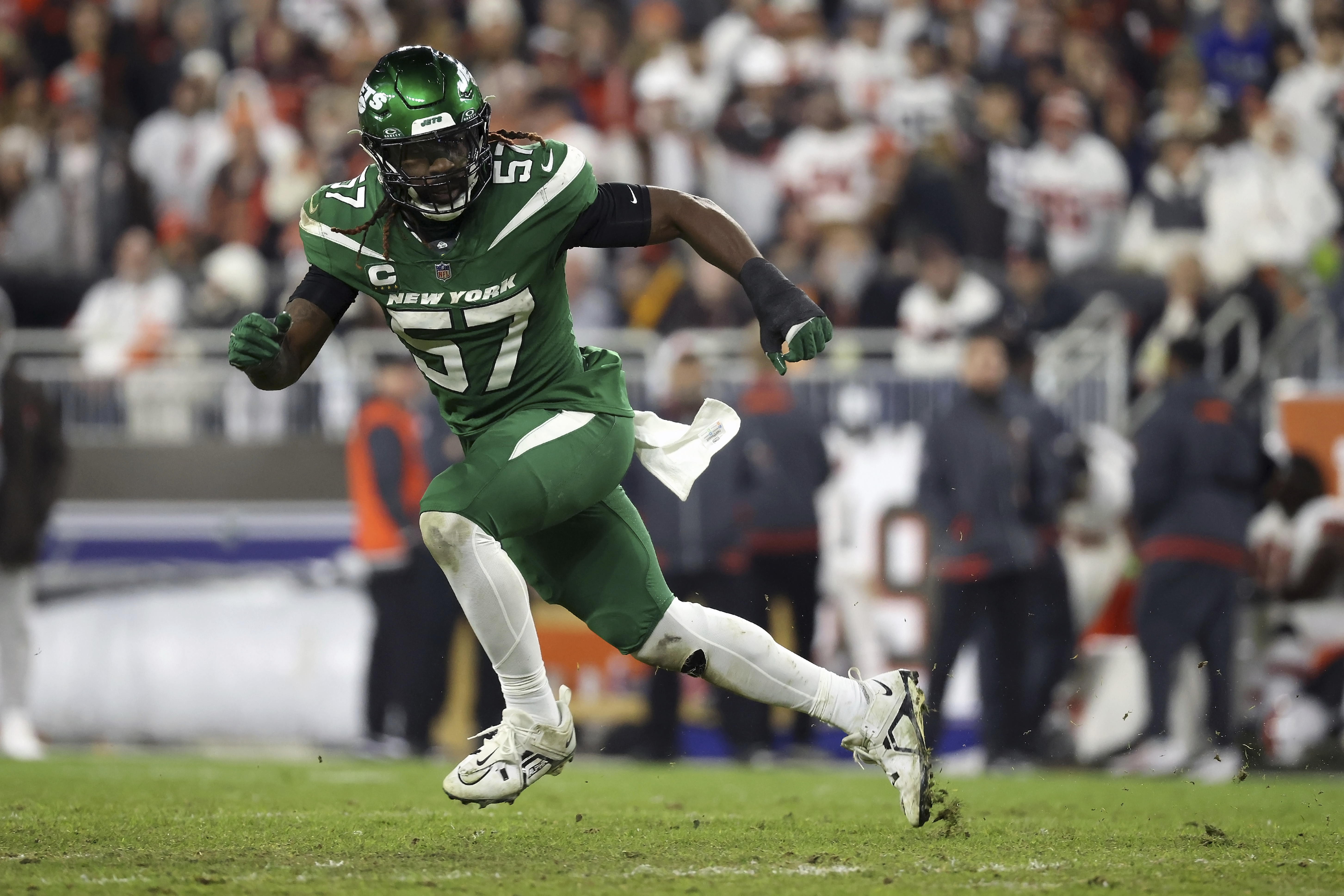 FILE - New York Jets linebacker C.J. Mosley (57) runs during an NFL football game against the Cleveland Browns, Thursday, Dec. 28, 2023, in Cleveland. The New York Jets and linebacker C.J. Mosley agreed to a new two-year contract worth $17.25 million that provide the team with more salary cap space in free agency, a person with knowledge of the deal told The Associated Press on Thursday, March 14, 2024.