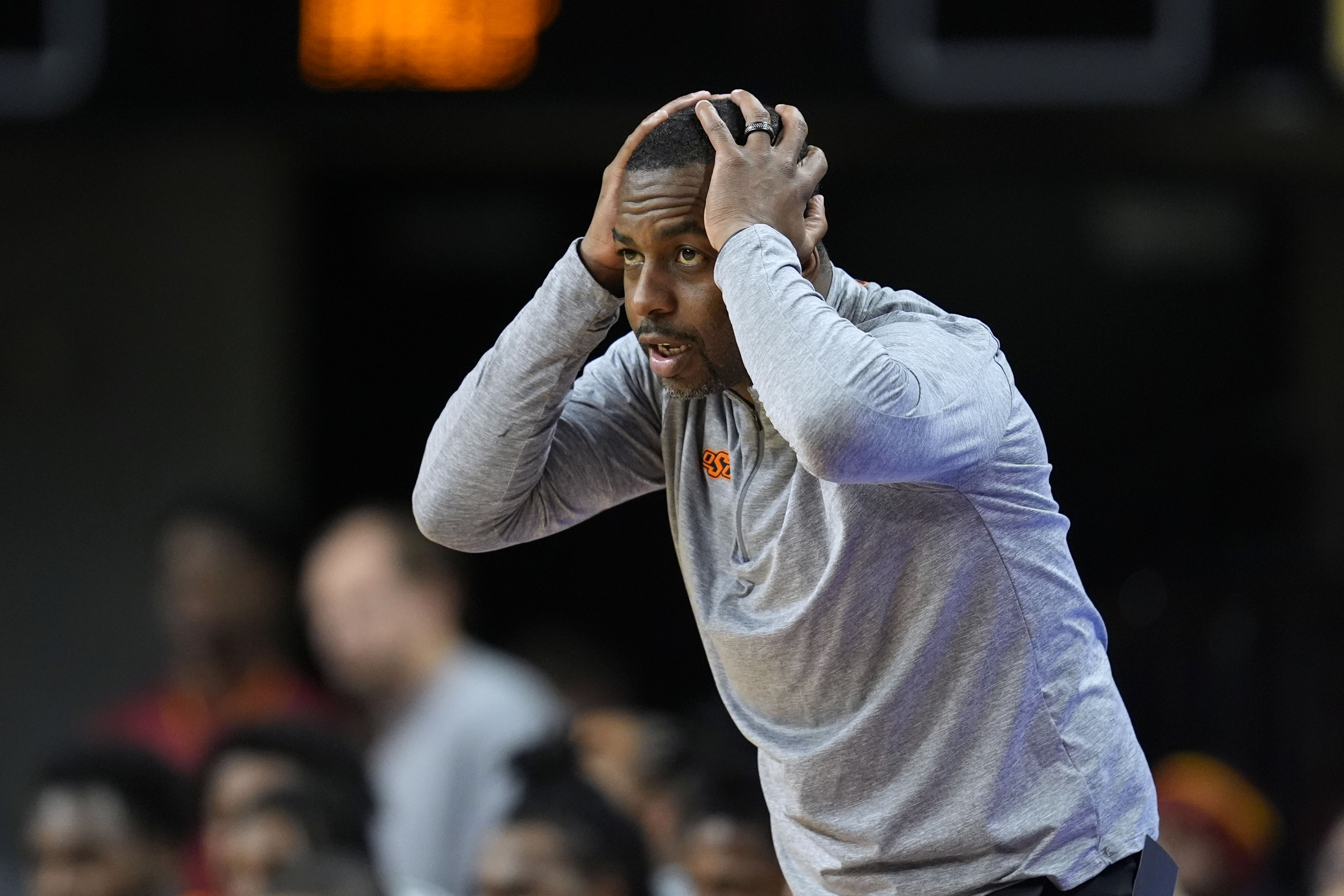 FILE - Oklahoma State head coach Mike Boynton reacts to a call during the first half of an NCAA college basketball game against Iowa State, Saturday, Jan. 13, 2024, in Ames, Iowa. Oklahoma State announced Thursday, March 14, 2024, that it has fired men’s basketball coach Mike Boynton. 