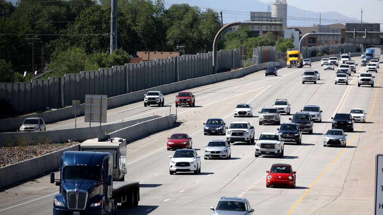 Vehicles travel on I-15 in Salt Lake City on June 16, 2023. This year is shaping up to be more expensive for road trips, according to data.