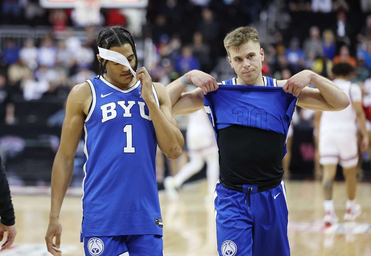 Brigham Young guard Trey Stewart (1) and Brigham Young Cougars guard Dallin Hall (30) exit the floor after the loss to Texas Tech during the Big 12 conference championship in Kansas City, Mo., on Thursday, March 14, 2024. Texas Tech won 81-67.