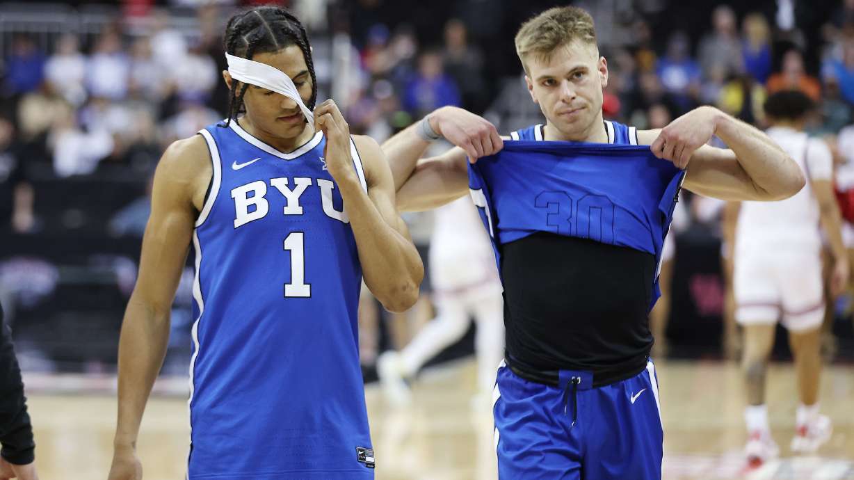 Brigham Young guard Trey Stewart (1) and Brigham Young Cougars guard Dallin Hall (30) exit the floor after the loss to Texas Tech during the Big 12 conference championship in Kansas City, Mo., on Thursday, March 14, 2024. Texas Tech won 81-67.
