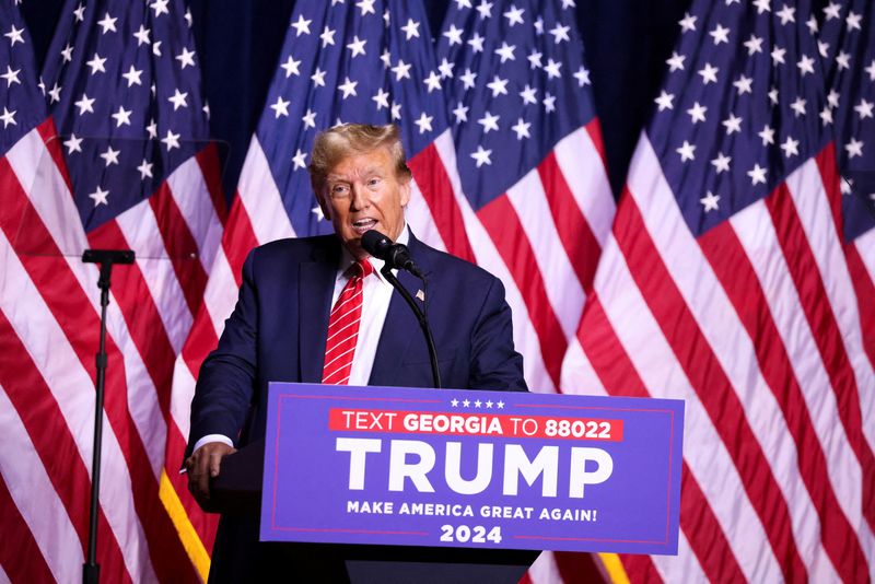 Republican presidential candidate and former President Donald Trump speaks during a campaign rally in Rome, Ga., March 9.  Trump's criminal trial stemming from a 2016 hush money payment to a porn star has been delayed till late April.