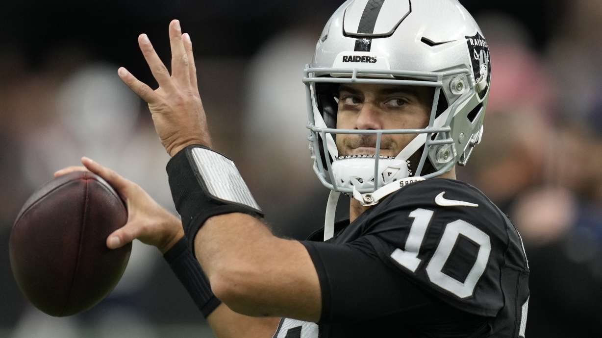 FILE - Las Vegas Raiders quarterback Jimmy Garoppolo (10) warms up before an NFL football game against the New England Patriots, Sunday, Oct. 15, 2023, in Las Vegas. Garoppolo, was by the Raiders earlier this week, has signed with the Los Angeles Rams as the backup to Matthew Stafford, the Rams announced Friday, March 15, 2024.