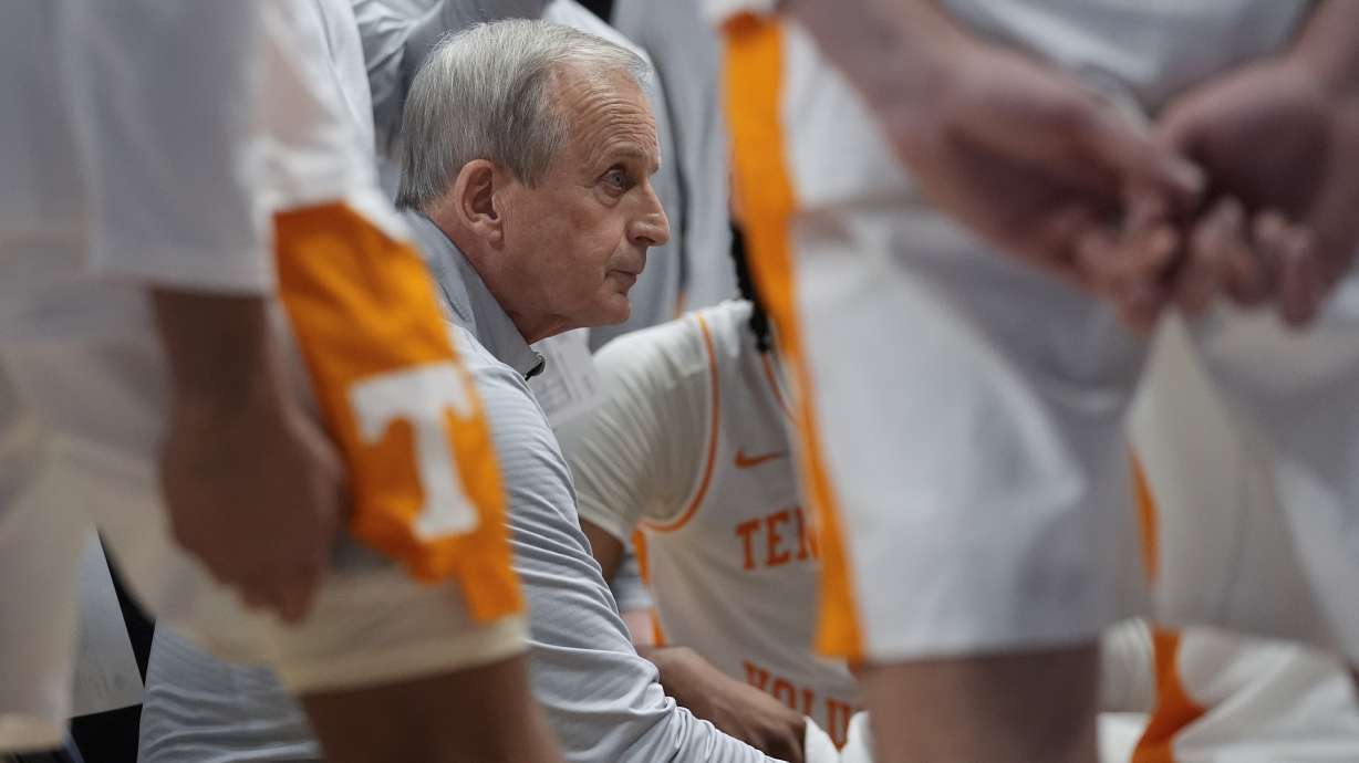Tennessee head coach Rick Barnes huddles his players during a timeout in the first half of an NCAA college basketball game against Mississippi State at the Southeastern Conference tournament Friday, March 15, 2024, in Nashville, Tenn.