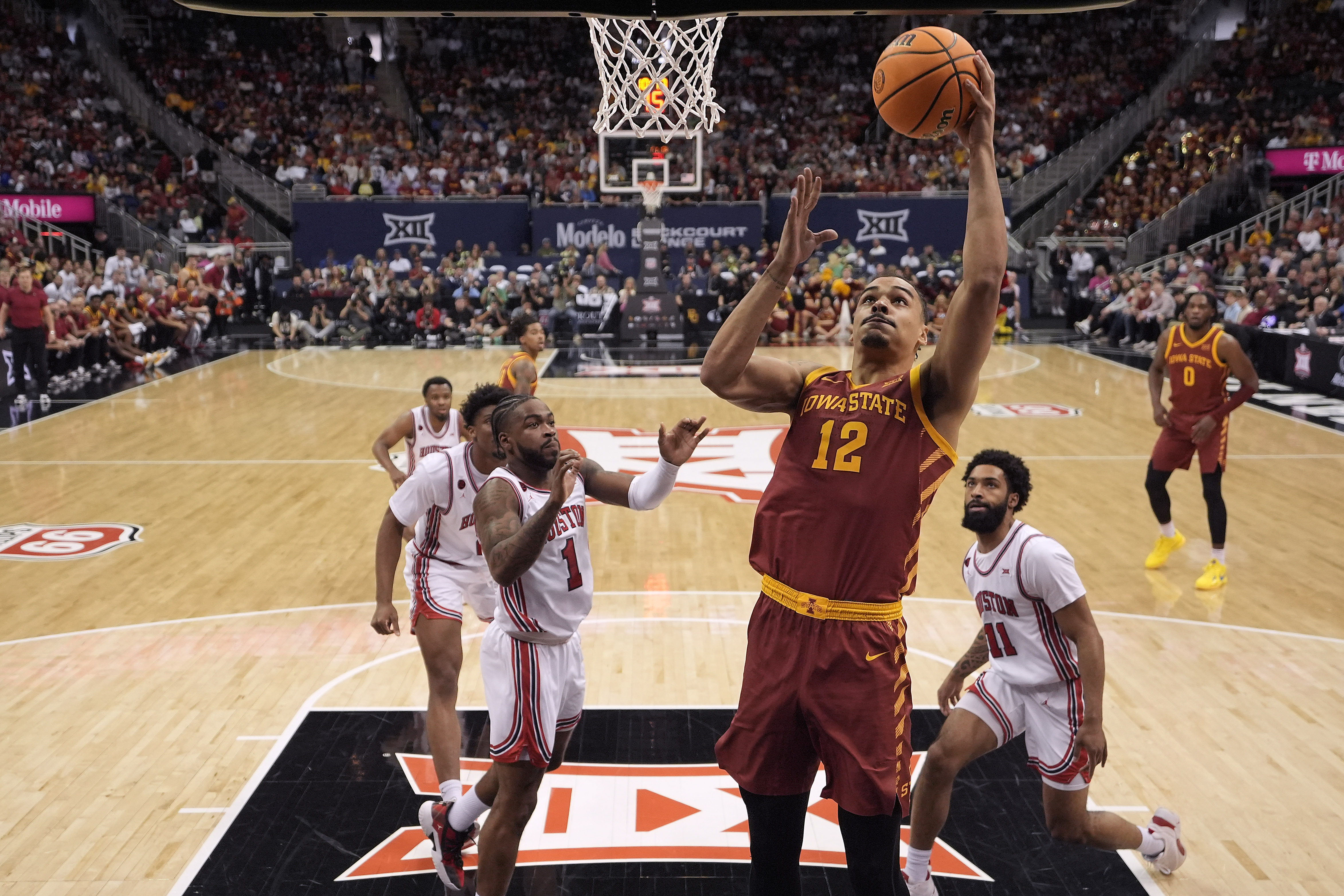 Iowa State forward Robert Jones (12) shoots during the first half of an NCAA college basketball game against Houston in the championship of the Big 12 Conference tournament, Saturday, March 16, 2024, in Kansas City, Mo.
