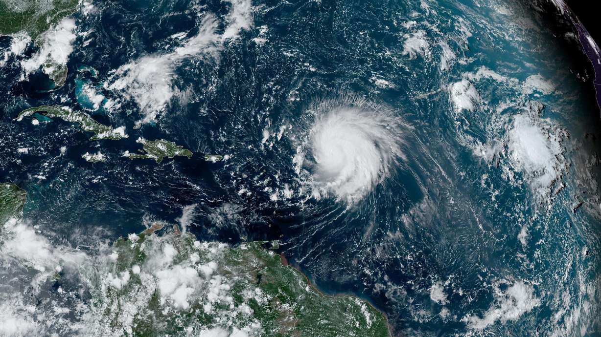 Hurricane Lee crosses the Atlantic Ocean as it moves west on Sept. 8, 2023. Ocean heat is fueling stronger hurricanes.