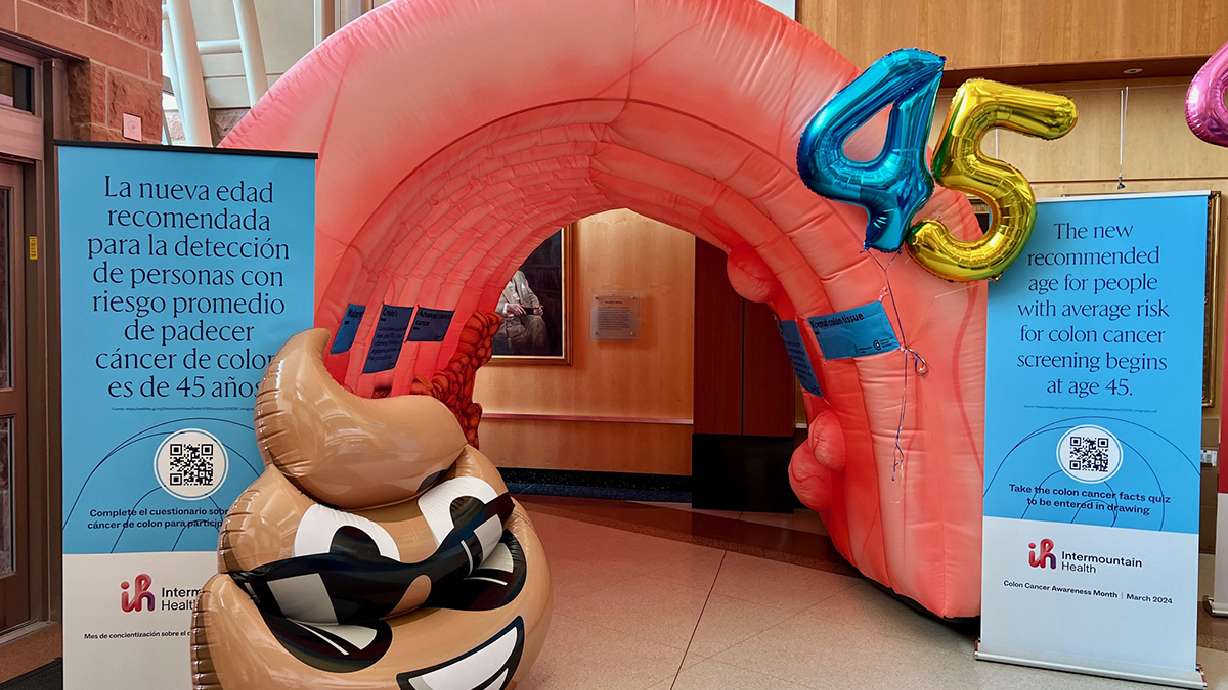 2 giant inflatable colons help Intermountain Health cancer experts raise colon cancer awareness
