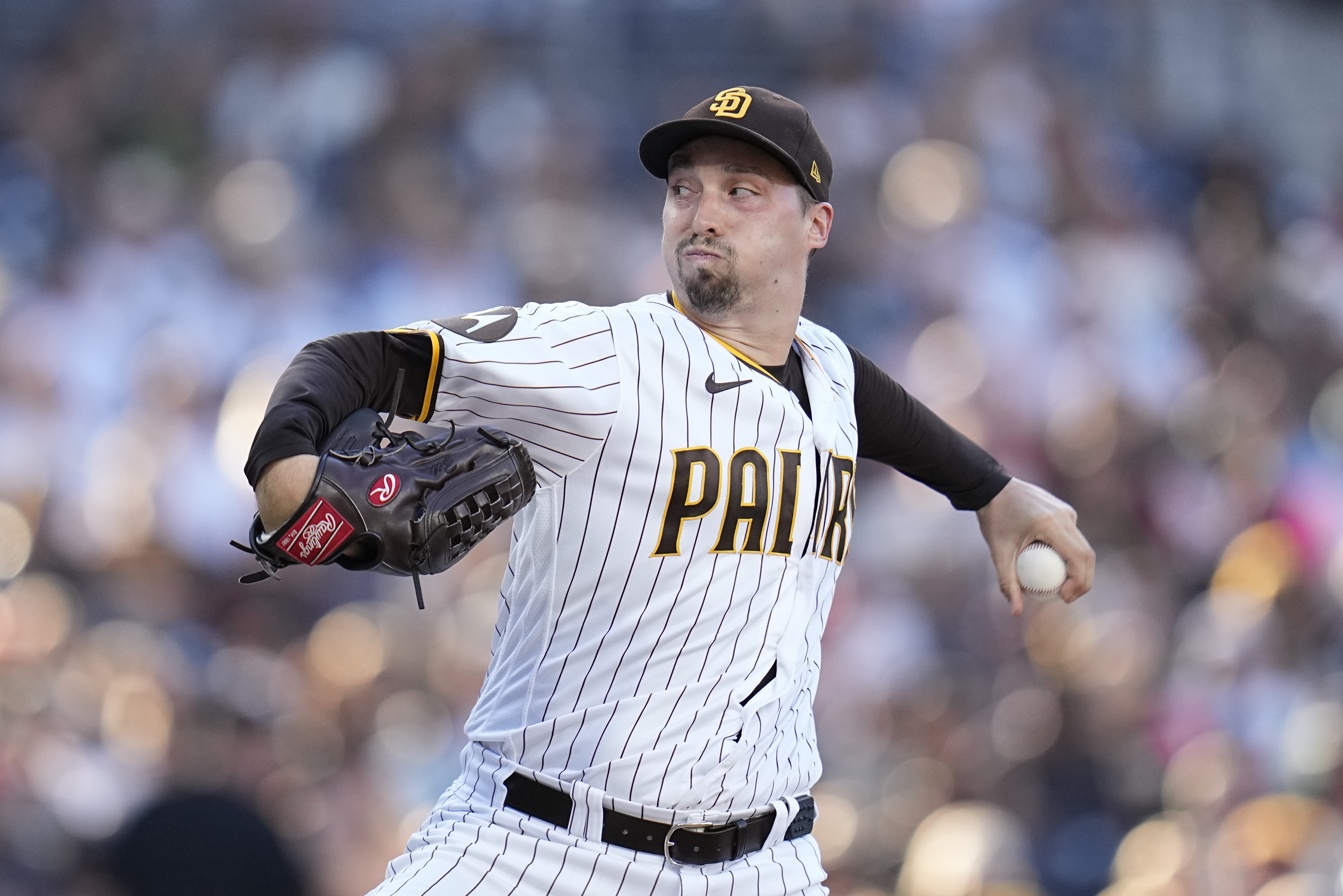 FILE - San Diego Padres starting pitcher Blake Snell works against a San Francisco Giants batter during the second inning of a baseball gam, Sept. 2, 2023, in San Diego. Two-time Cy Young Award winner Snell and the San Francisco Giants have agreed to a $62 million, two-year contract, a person familiar with the negotiations told The Associated Press on Monday, March 18, 2024. 