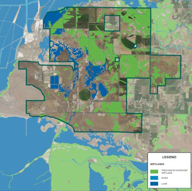 The image shows wetlands in western Weber County and the area, bordered in dark green, where the Utah Inland Port Authority proposes a development project. Another smaller portion of the proposed Weber County inland port area sits further east, not shown on the image.