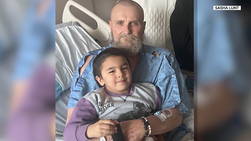 Rick Collins in the hospital being visited by Sasha Lunt’s nephew, Cory.