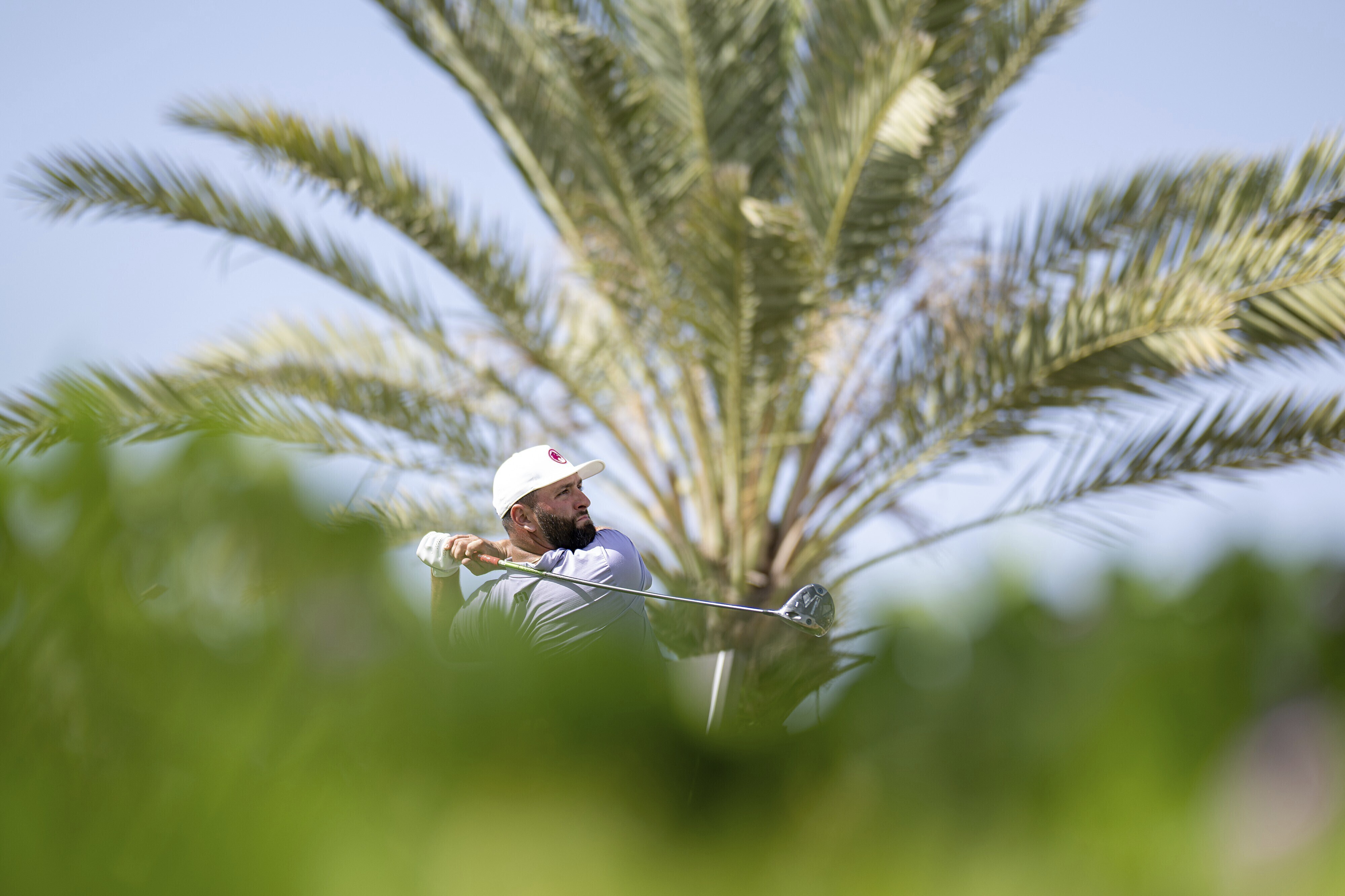 Captain Jon Rahm of Legion XIII GC hits his shot from the second tee during the first round of LIV Golf Jeddah at the Royal Greens Golf & Country Club on Friday, March 1, 2024, in King Abdullah Economic City, Saudi Arabia. 