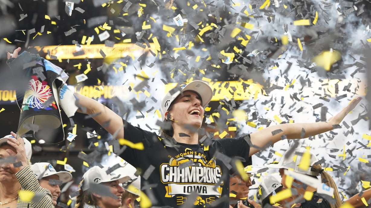 Iowa guard Caitlin Clark celebrates after the overtime win of an NCAA college basketball game against Nebraska in the final of the Big Ten women's tournament, Sunday, March 10, 2024, in Minneapolis.