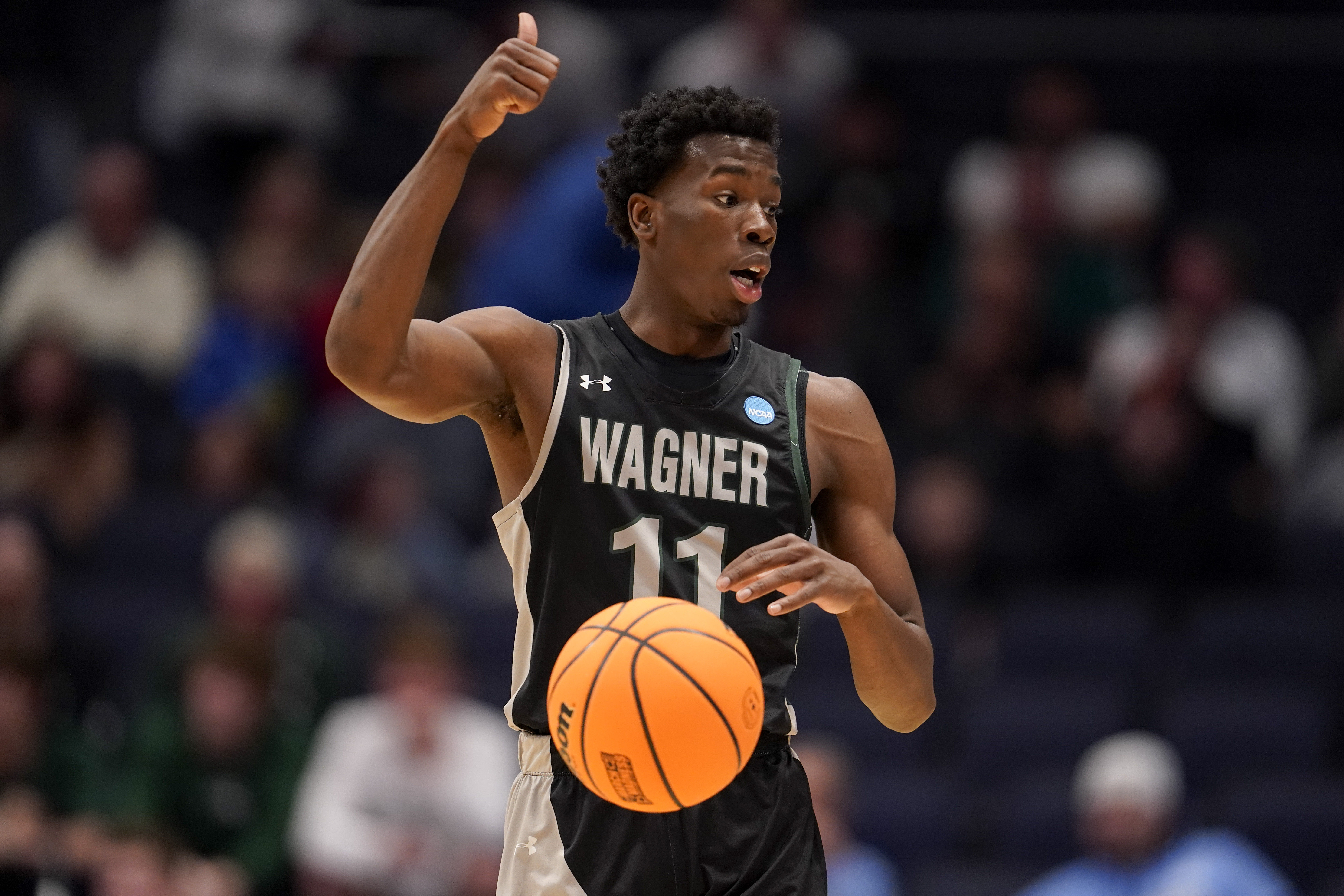 Wagner's Melvin Council Jr. gestures during the first half of the team's First Four college basketball game against Howard in the men's NCAA Tournament on Tuesday, March 19, 2024, in Dayton, Ohio.