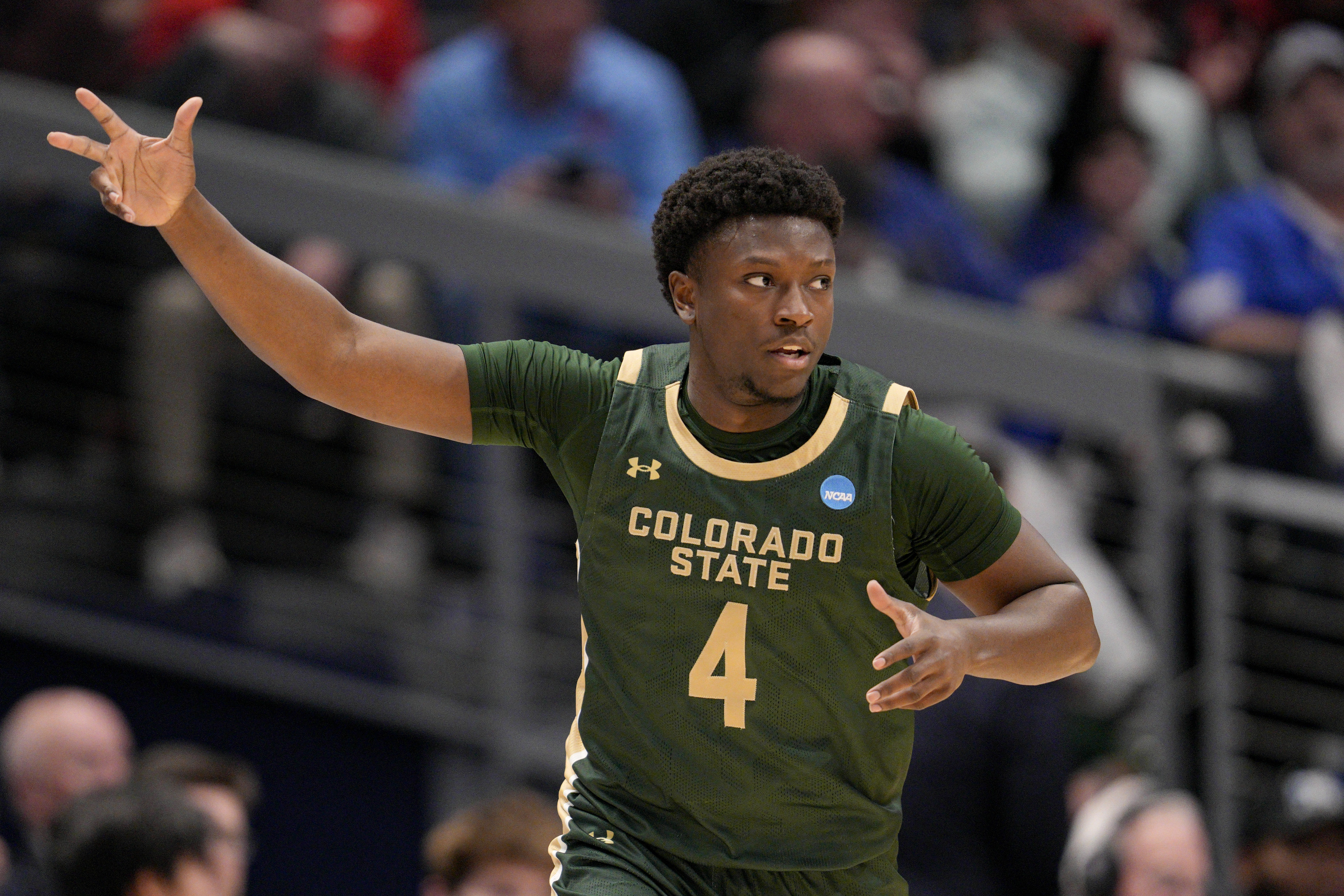 Colorado State's Isaiah Stevens reacts after making a three-point basket during the first half of a First Four college basketball game against Virginia in the NCAA Tournament in Dayton, Ohio, Tuesday, March 19, 2024.