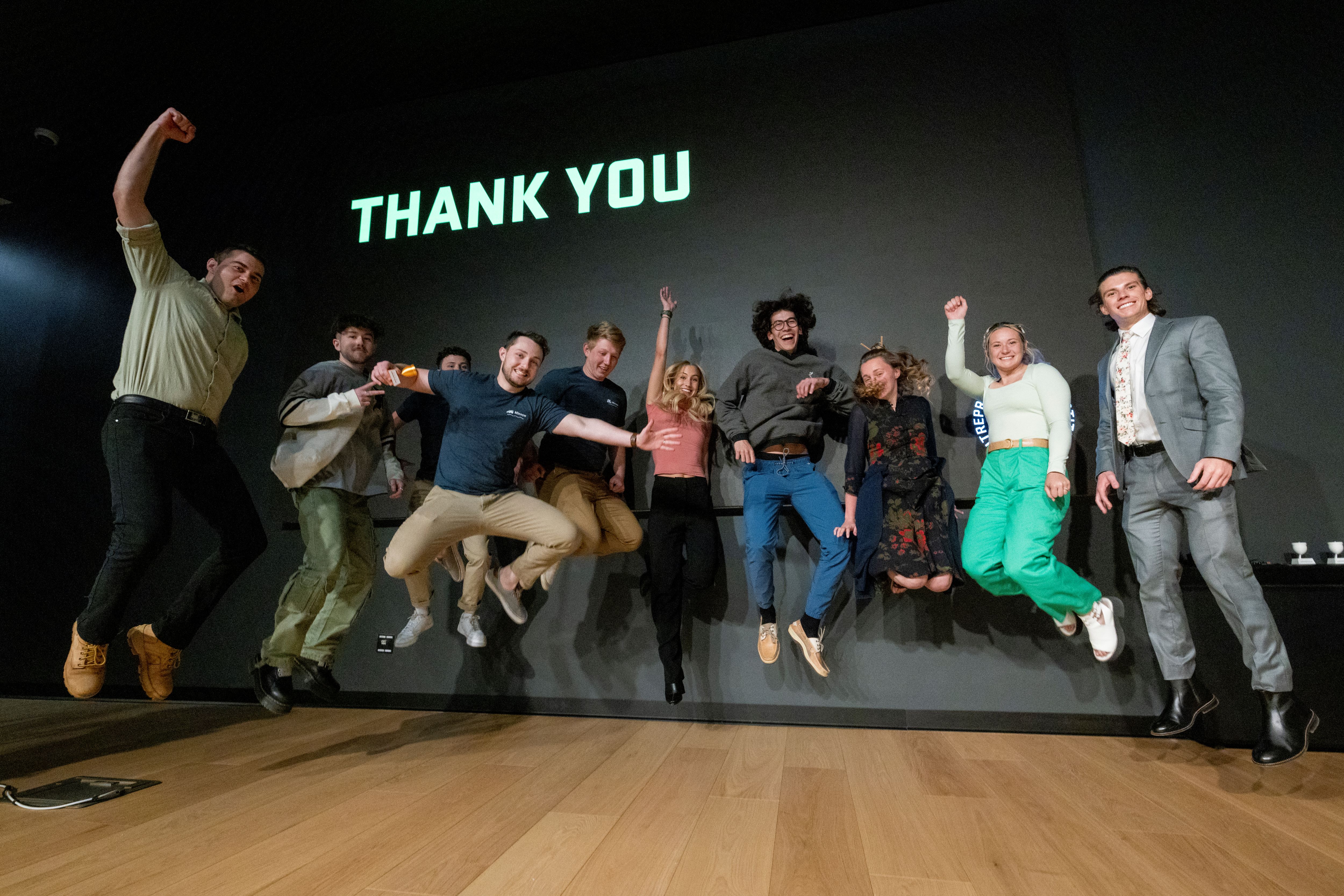 Students celebrate after winning seed funding for their businesses at an Entrepreneurship Institute pitch event in April 2023.