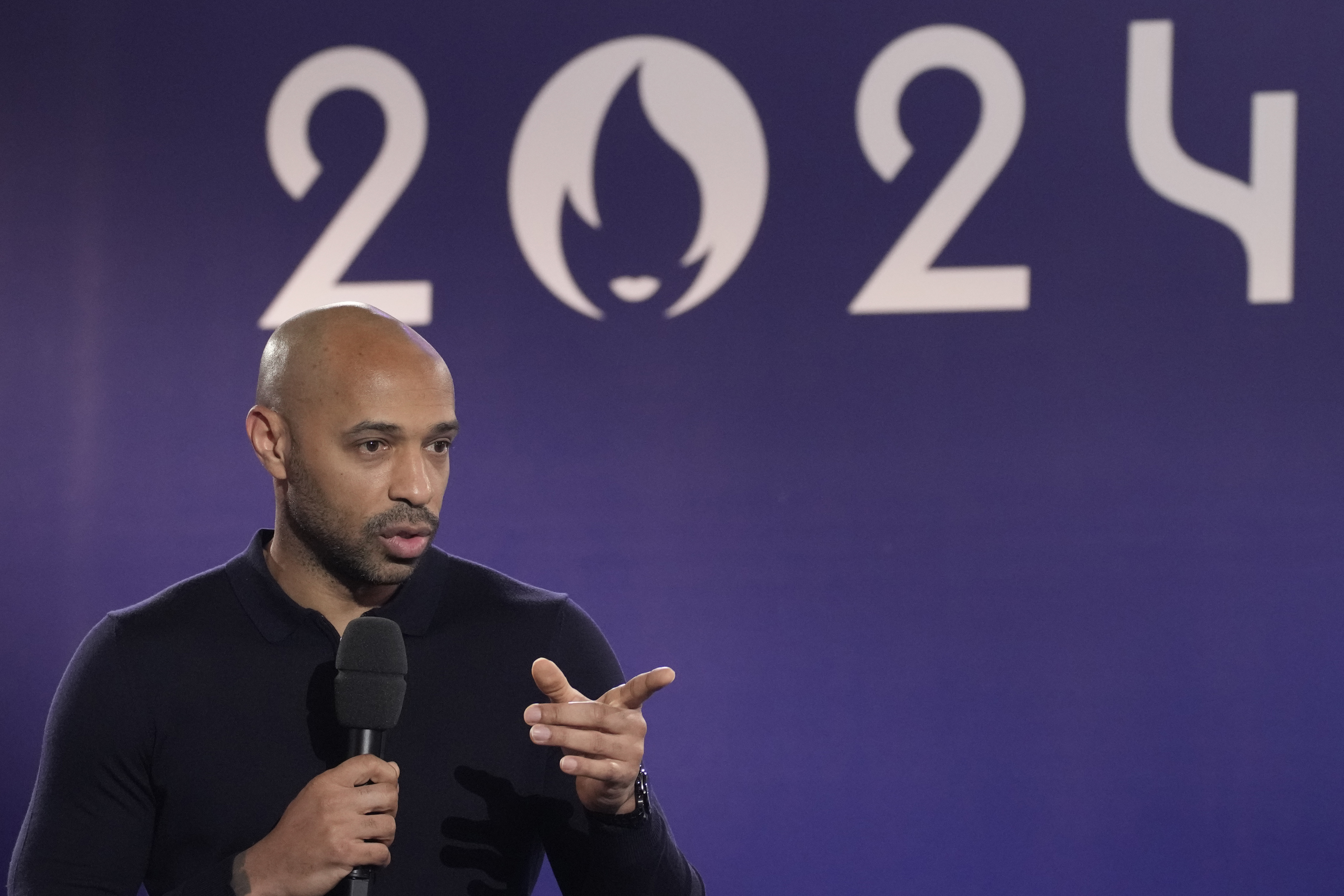 Former French soccer star Thierry Henry attends the draw for the Paris 2024 Olympic Soccer tournaments, Wednesday, March 20, 2024 in Saint-Denis, outside Paris. 