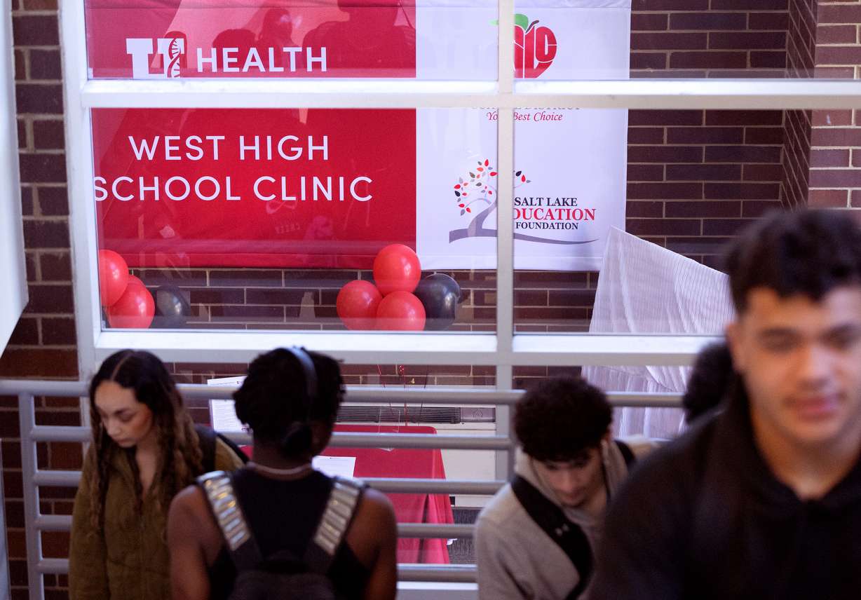 Students walk past the West High School Clinic in Salt Lake City on Wednesday. The clinic will provide a wide range of services to students (with parent consent), including preventative care, vaccinations, mental health support and general health care.