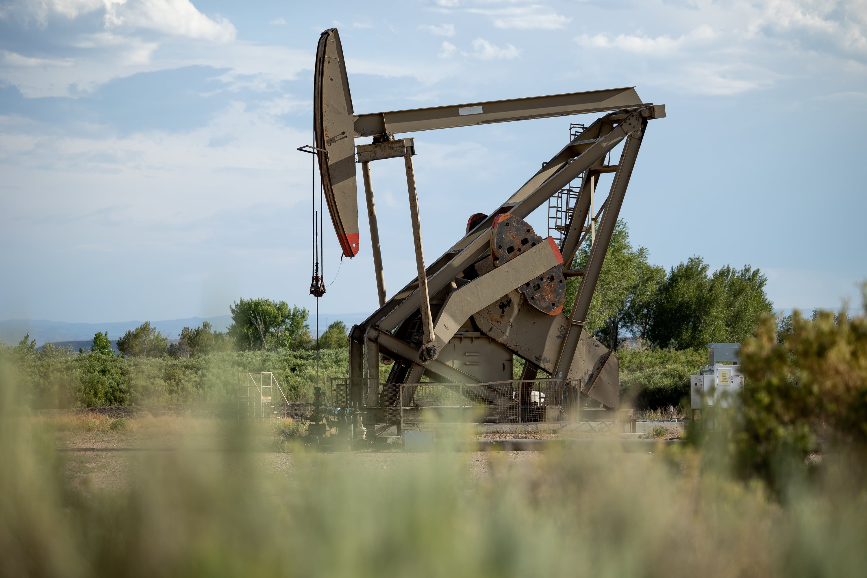 A pumpjack pulls oil from a well in Duchesne on July 27, 2022. Critics say draft resource management plans put forward by the Bureau of Land Management are slated to take more than 6 million acres off the table.