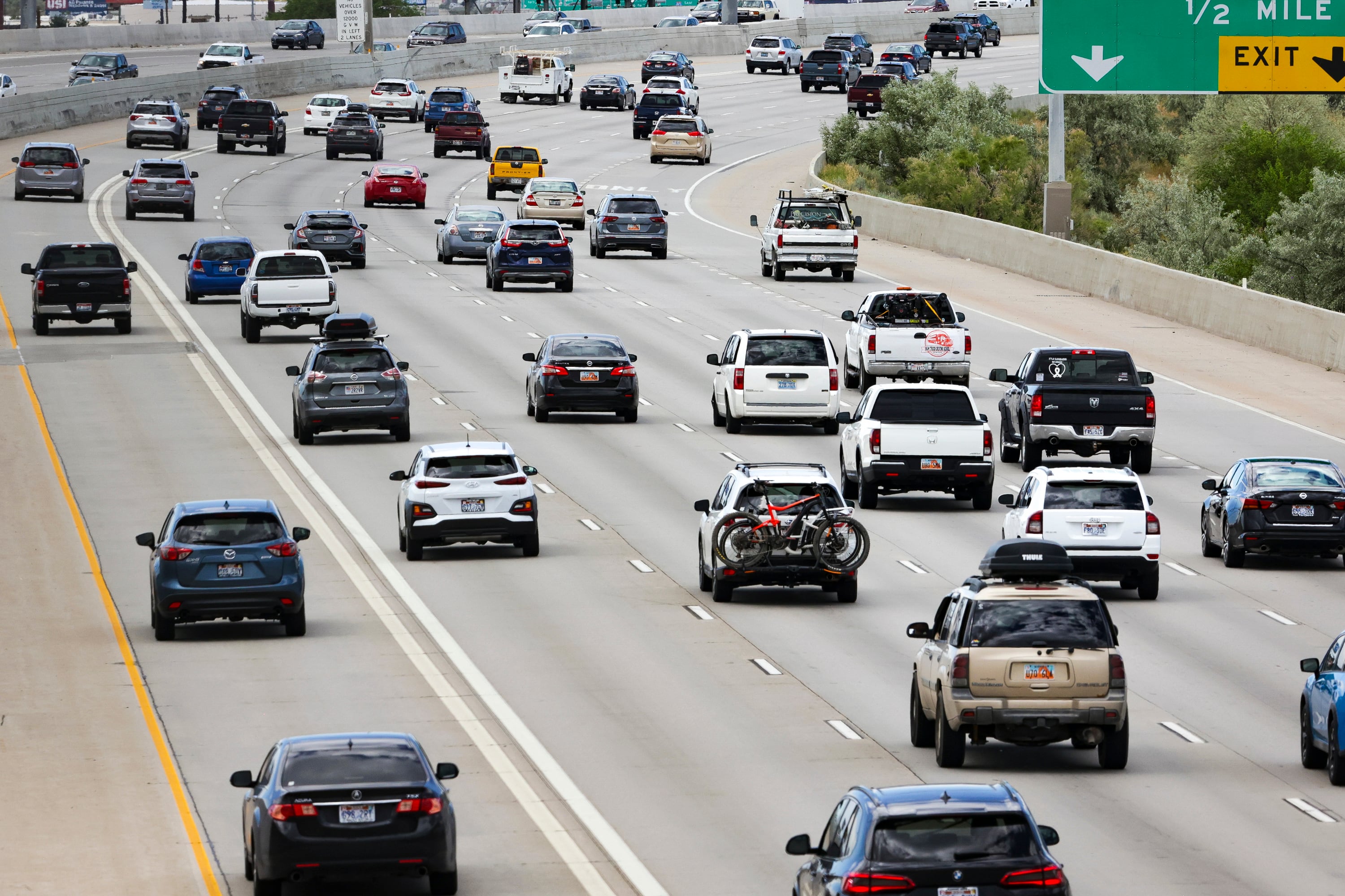 Traffic moves along I-15 during rush hour in Salt Lake City on July 1, 2022. The U.S. Environmental Protection Agency unveiled new regulations Wednesday aimed at curbing tailpipe emissions.