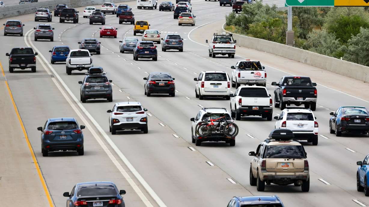 Traffic moves along I-15 during rush hour in Salt Lake City on July 1, 2022. The U.S. Environmental Protection Agency unveiled new regulations Wednesday aimed at curbing tailpipe emissions.