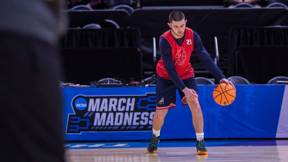 Samford guard Rylan Jones dribbles a basketball during a drill at a team practice at the Delta Center on Wednesday, March 20, 2024. Jones is from Utah and played at Utah and Utah State before transferring to Sanford.
