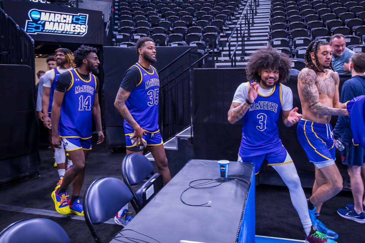 McNeese State guard Mike Saunders Jr., No. 3, cheers as his team walks onto the Delta Center court for practice on Wednesday. Saunders played at Wasatch Academy and the University of Utah before transferring to McNeese State.
