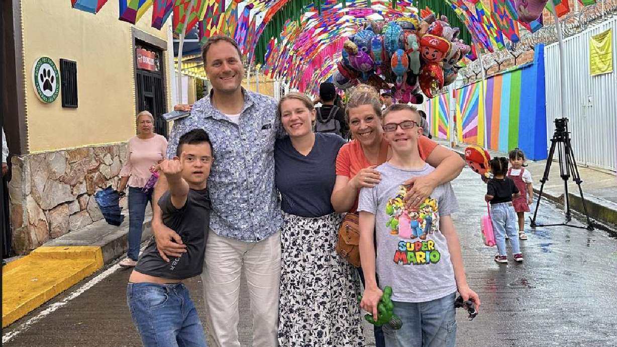 Vaughn Janus is pictured with his new family, the Januses, from Colorado. He recently got to meet a Utah girl who donated her Disneyland money as a 7-year-old to help his adoption fund 10 years ago.