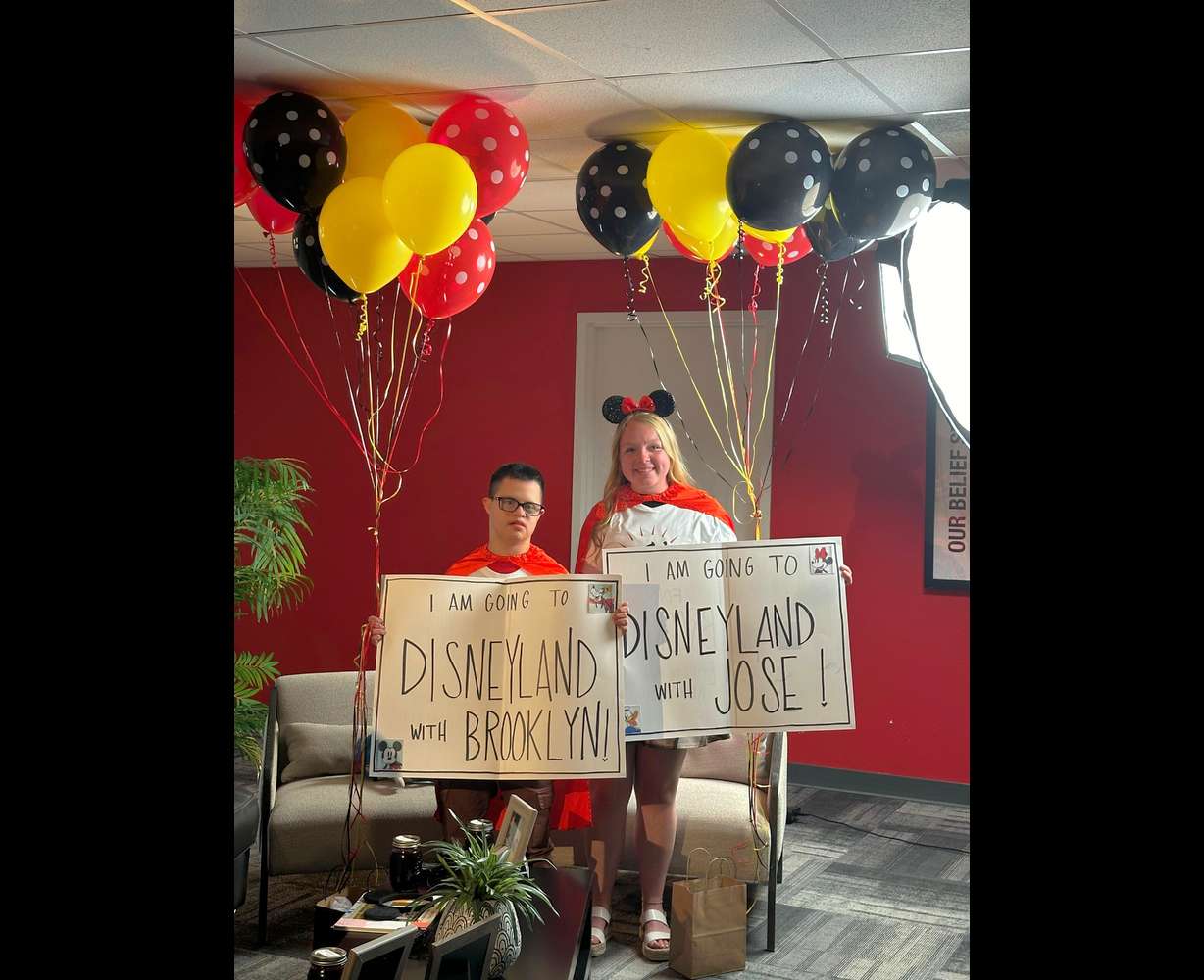 Vaughn and Brooklyn McKenzie celebrate a surprise trip to Disneyland during their first meeting together. Ten years ago, Brooklyn donated money she earned to go to Disneyland to Vaughn's adoption fees.