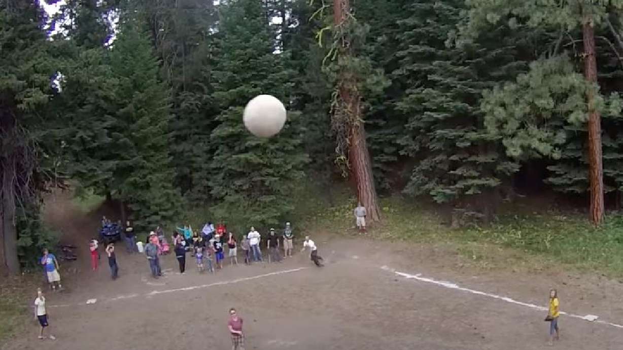 A camera on a drone films a softball game in this video posted three weeks ago.