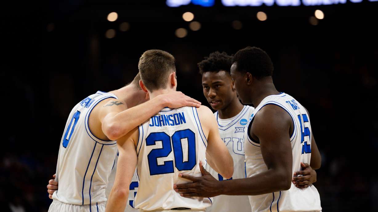Brigham Young players circle up on the court during the game between the Brigham Young Cougars and the Duquesne Dukes in the first round of the 2024 NCAA Tournament at the CHI Health Center in Omaha on Thursday, March 21, 2024.