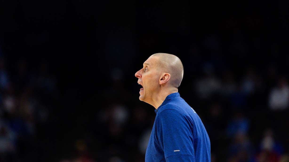 Brigham Young Cougars head coach Mark Pope yells during the game between the Brigham Young Cougars and the Duquesne Dukes in the first round of the 2024 NCAA Tournament at the CHI Health Center in Omaha on Thursday, March 21, 2024.