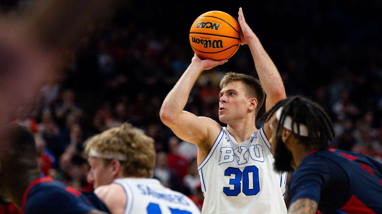 Brigham Young Cougars guard Dallin Hall (30) shoots a free throw during the game between the Brigham Young Cougars and the Duquesne Dukes in the first round of the 2024 NCAA Tournament at the CHI Health Center in Omaha on Thursday, March 21, 2024.