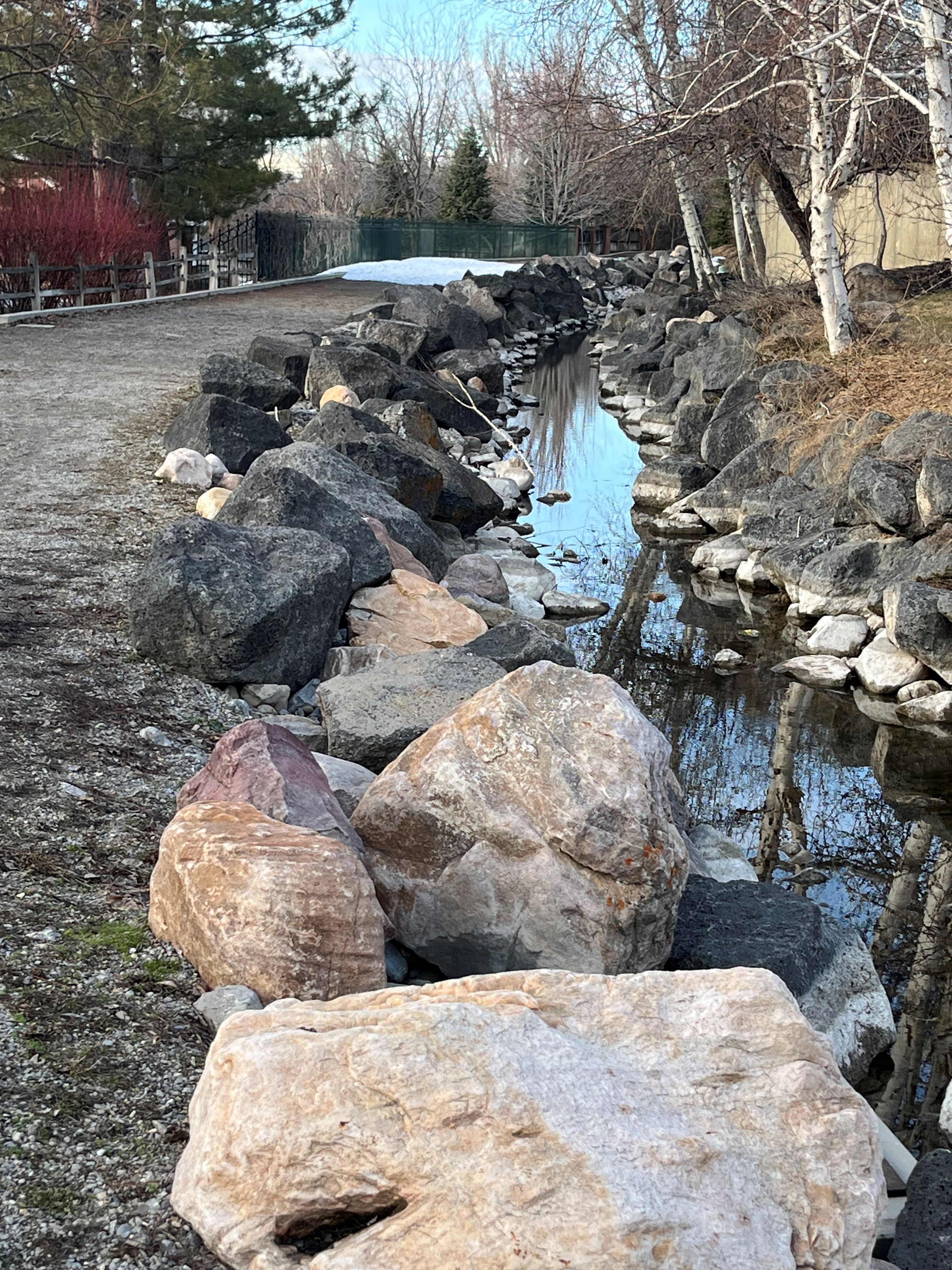The canal trail in Lundstrom Park is well-maintained for recreation.