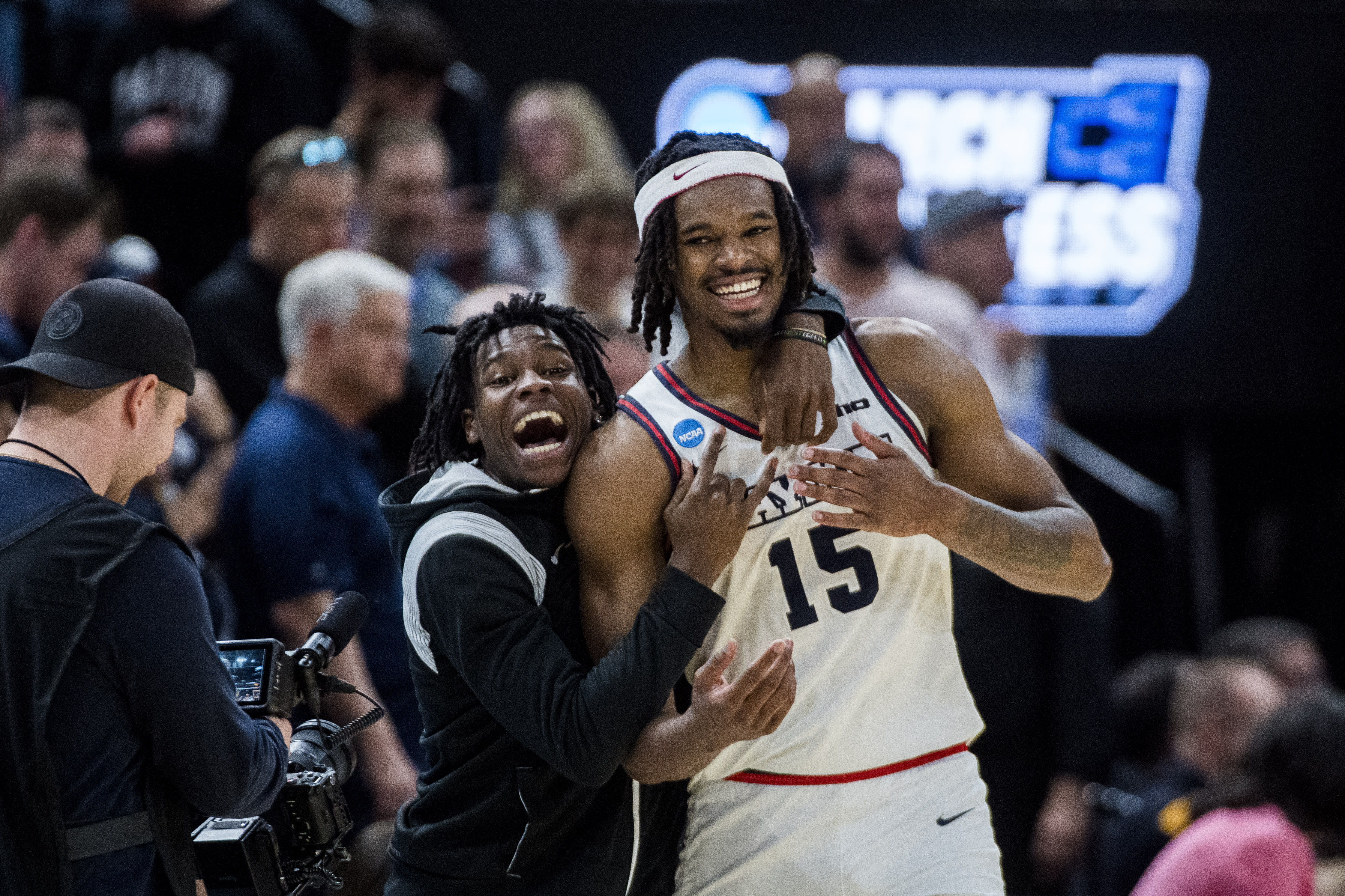 Dayton forward DaRon Holmes II (15) celebrates his team's victory over Nevada after a first-round college basketball game in the NCAA Tournament in Salt Lake City, Thursday, March 21, 2024 