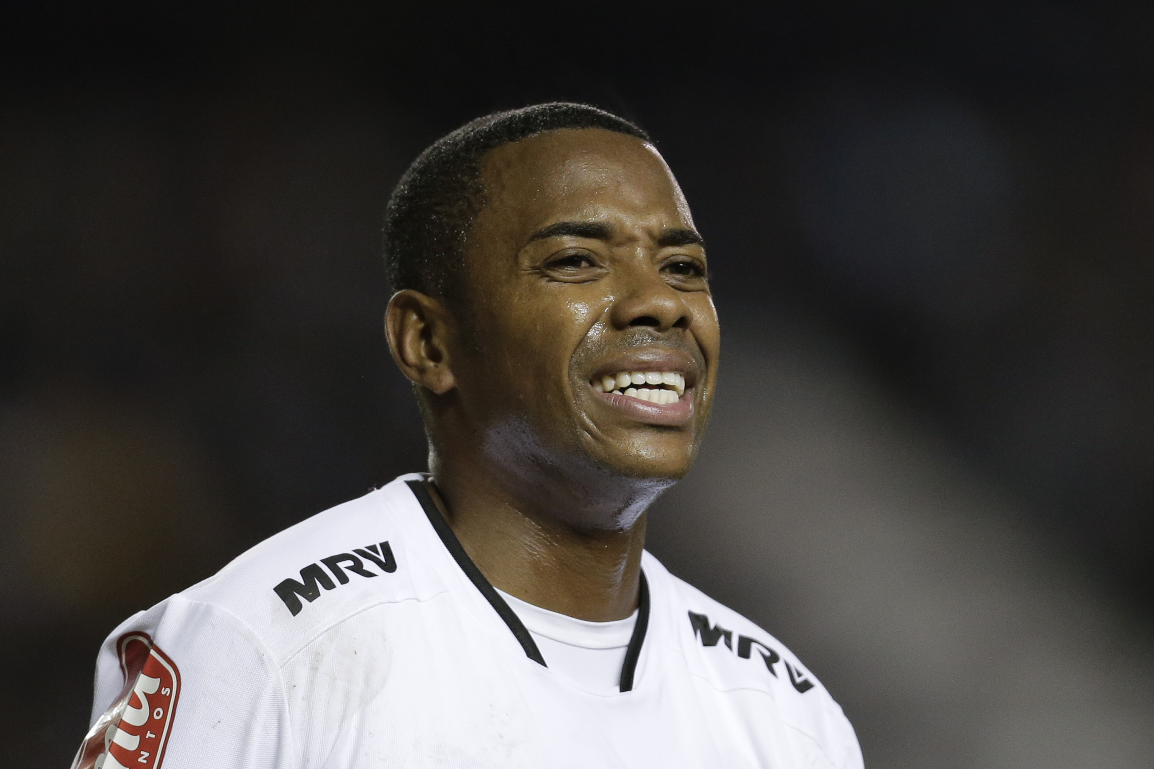 FILE - Atletico Mineiro's Robinho reacts after failing to score during a Copa Libertadores soccer match against Argentina's Racing in Buenos Aires, Argentina, April 27, 2016. Former soccer star turned himself in on Thursday, March 21, 2024, to start serving a nine-year prison sentence in his native Brazil more than 10 years after he was first accused of raping a woman in Italy. 