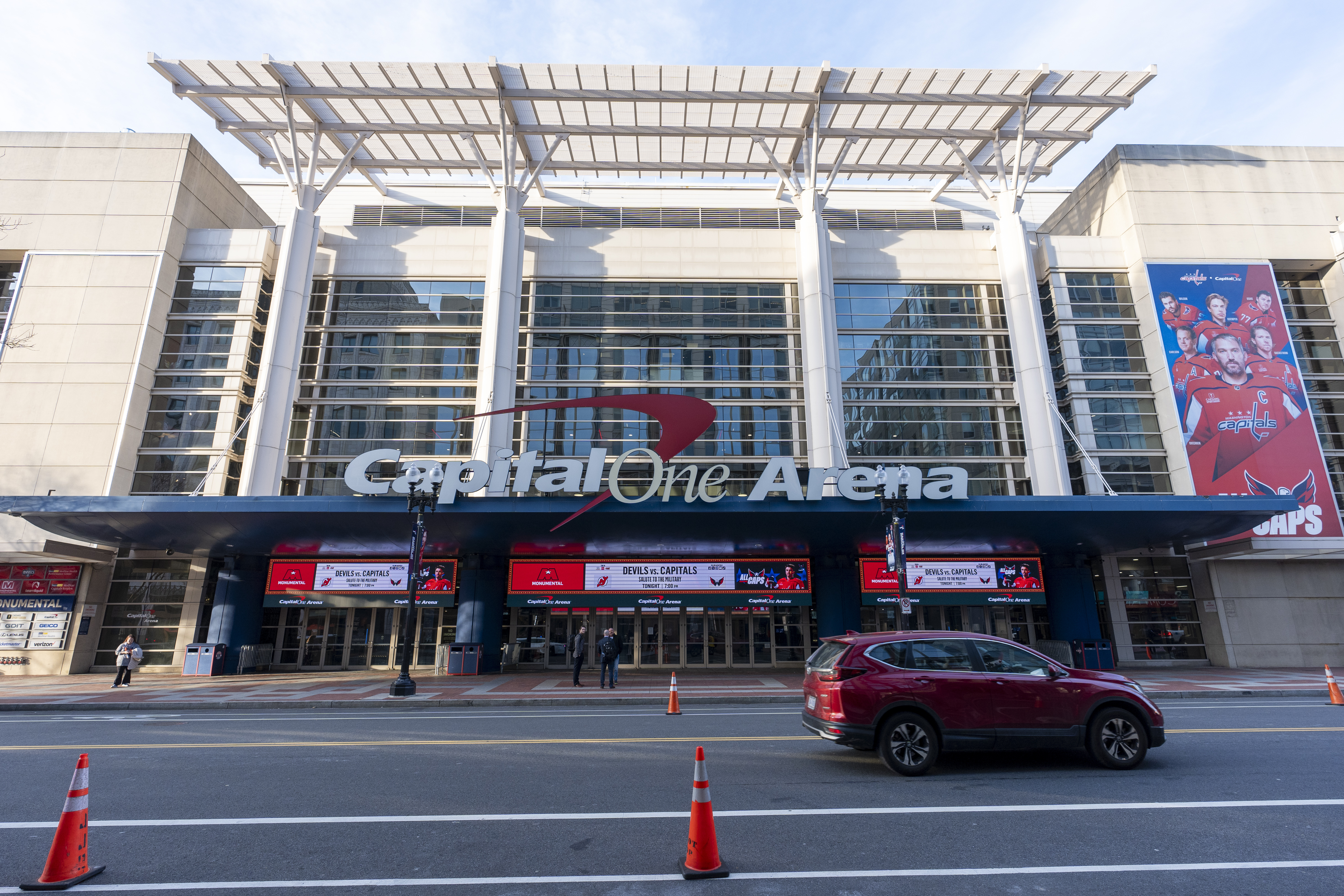 Capital One Arena is shown before an NHL hockey game between the Washington Capitals and the New Jersey Devils, Tuesday, Feb. 20, 2024, in Washington. The proposed move of the Capitals and Wizards sports teams to nearby Virginia has stoked concern in a pair of fragile Washington neighborhoods. Residents and business owners in Chinatown fear that the departure of the teams would devastate the neighborhood around the Capital One Arena. 