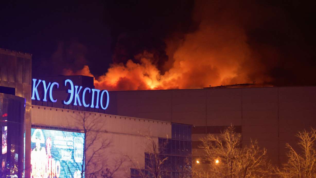 Smoke rises above the burning Crocus City Hall concert venue following a reported shooting incident, outside Moscow on Friday.