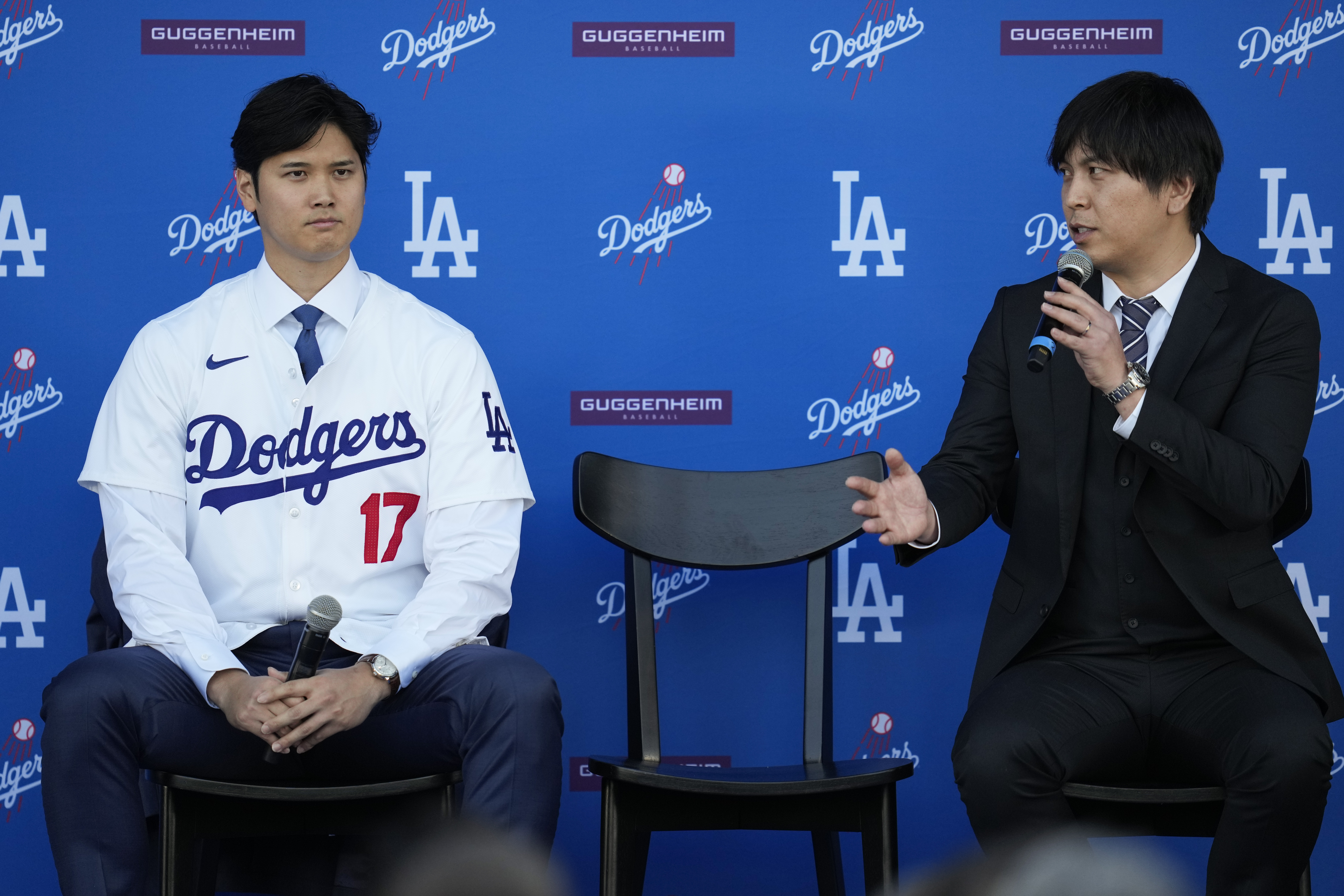 FILE - Los Angeles Dodgers' Shohei Ohtani, left, and interpreter Ippei Mizuhara answer questions during a news conference at Dodger Stadium on Dec. 14, 2023, in Los Angeles. Mizuhara has been fired from the Dodgers following allegations of illegal gambling and theft. 