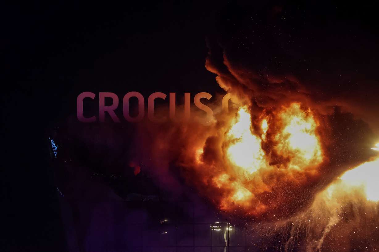 The Crocus City Hall concert venue burns following a shooting incident, outside Moscow, Russia, Friday.