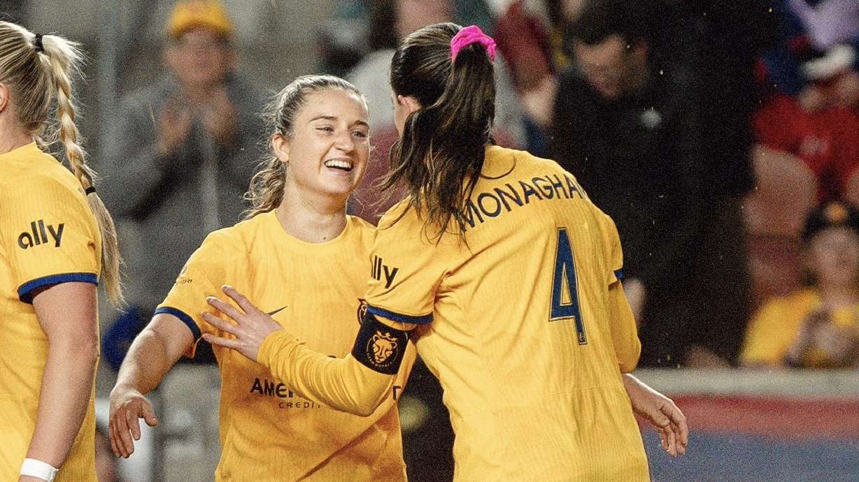 Ally Sentnor, left, celebrates her first NWSL goal with Paige Monaghan, right, against the North Carolina Courage at America First Field.
