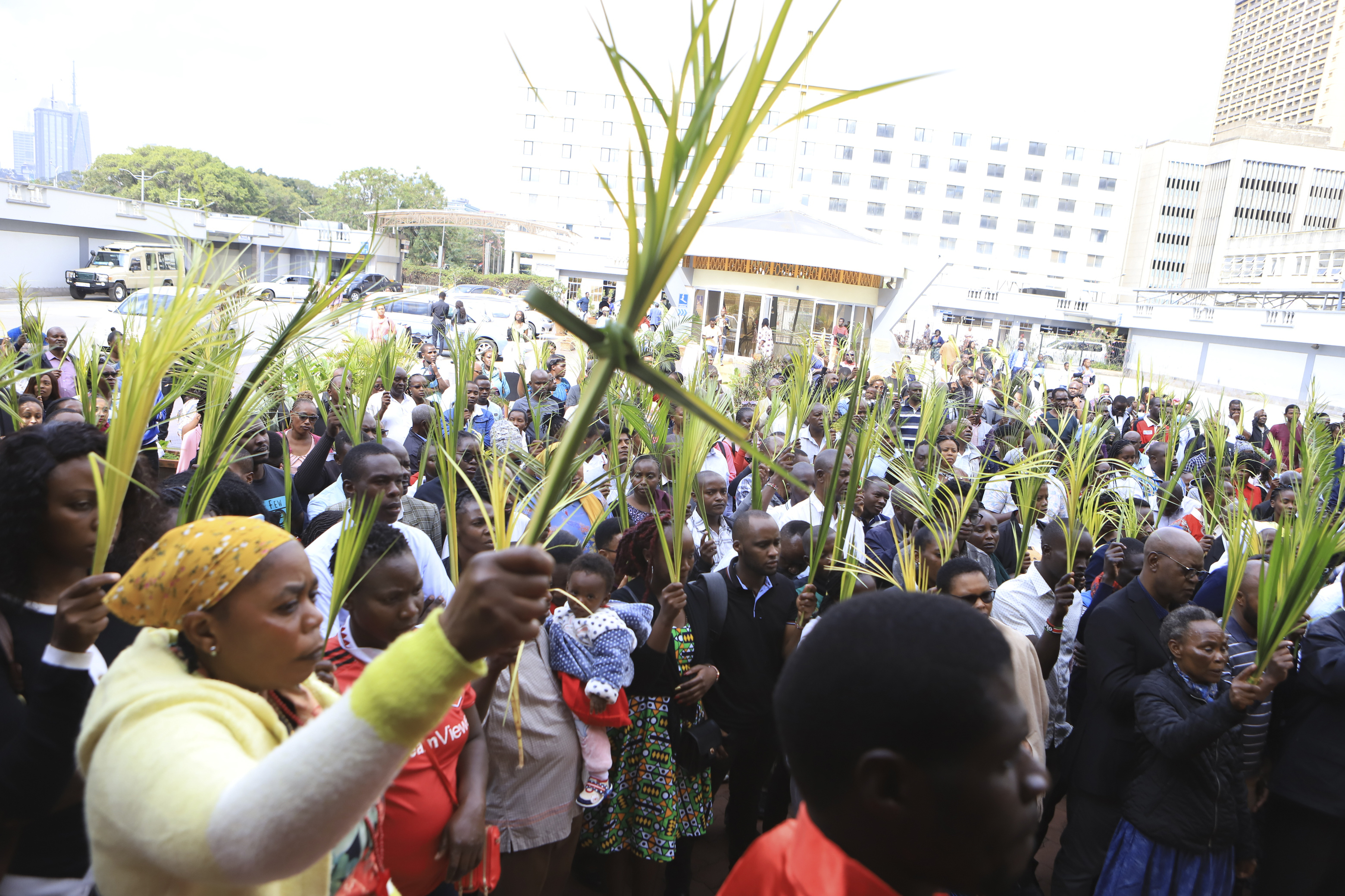 Christian faithful march carrying green Palm branches to commemorate Palm Sunday, which marks the entry of Jesus Christ into Jerusalem, in the streets of Nairobi, Kenya, April 2, 2023. Palm Sunday will be celebrated by Christians worldwide Sunday. It commemorates the Christian belief in the triumphant entry of Jesus into Jerusalem, when palm branches were strewn before him. It marks the start of Holy Week.