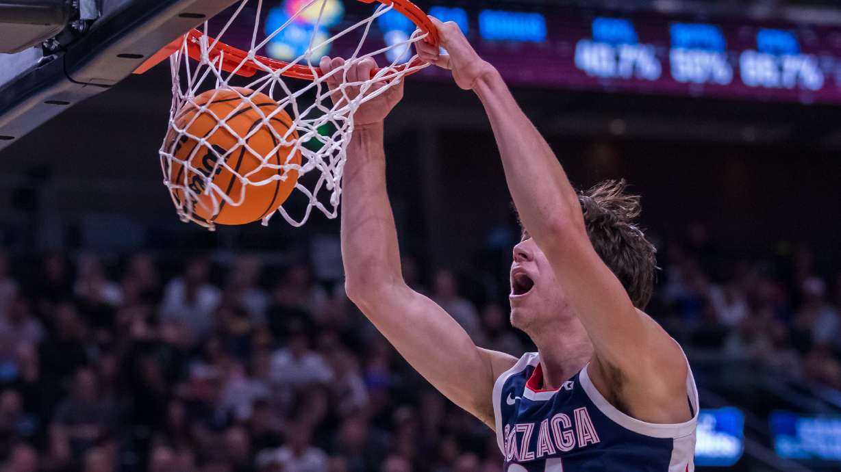 Gonzaga forward Braden Huff dunks the ball during a game between Gonzaga and Kansas in the second round of the NCAA men's basketball tournament at the Delta Center in Salt Lake City on Saturday.