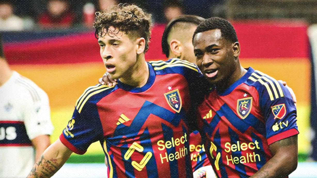 Fidel Barajas, left, and Anderson Julio, right, celebrate a goal for Real Salt Lake in Vancouver.