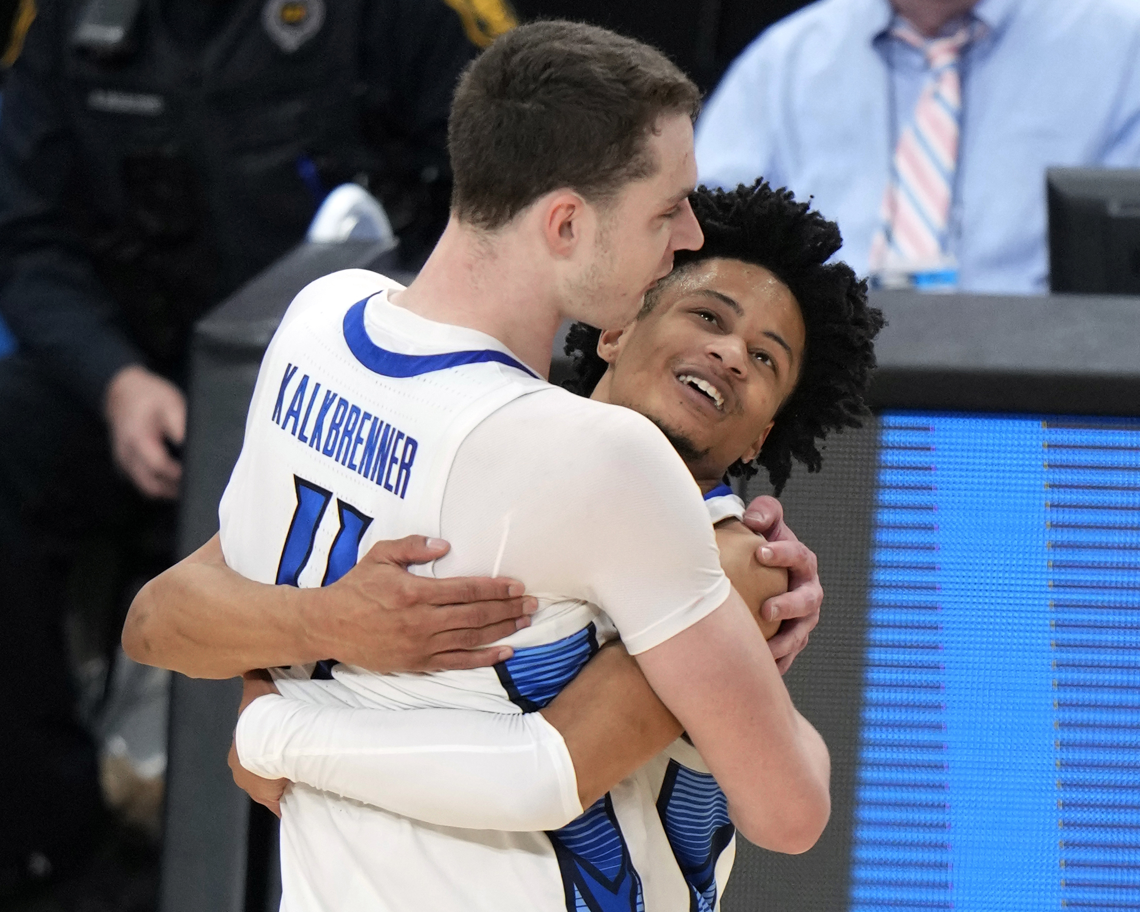 Creighton's Ryan Kalkbrenner (11) celebrates with Trey Alexander after a double overtime win in a second-round college basketball game in the NCAA Tournament against Oregon in Pittsburgh, Sunday, March 24, 2024. 