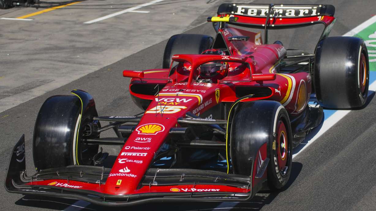 Ferrari driver Carlos Sainz of Spain steers his car out of pit lane during the Australian Formula One Grand Prix at Albert Park, in Melbourne, Australia, Sunday, March 24, 2024.