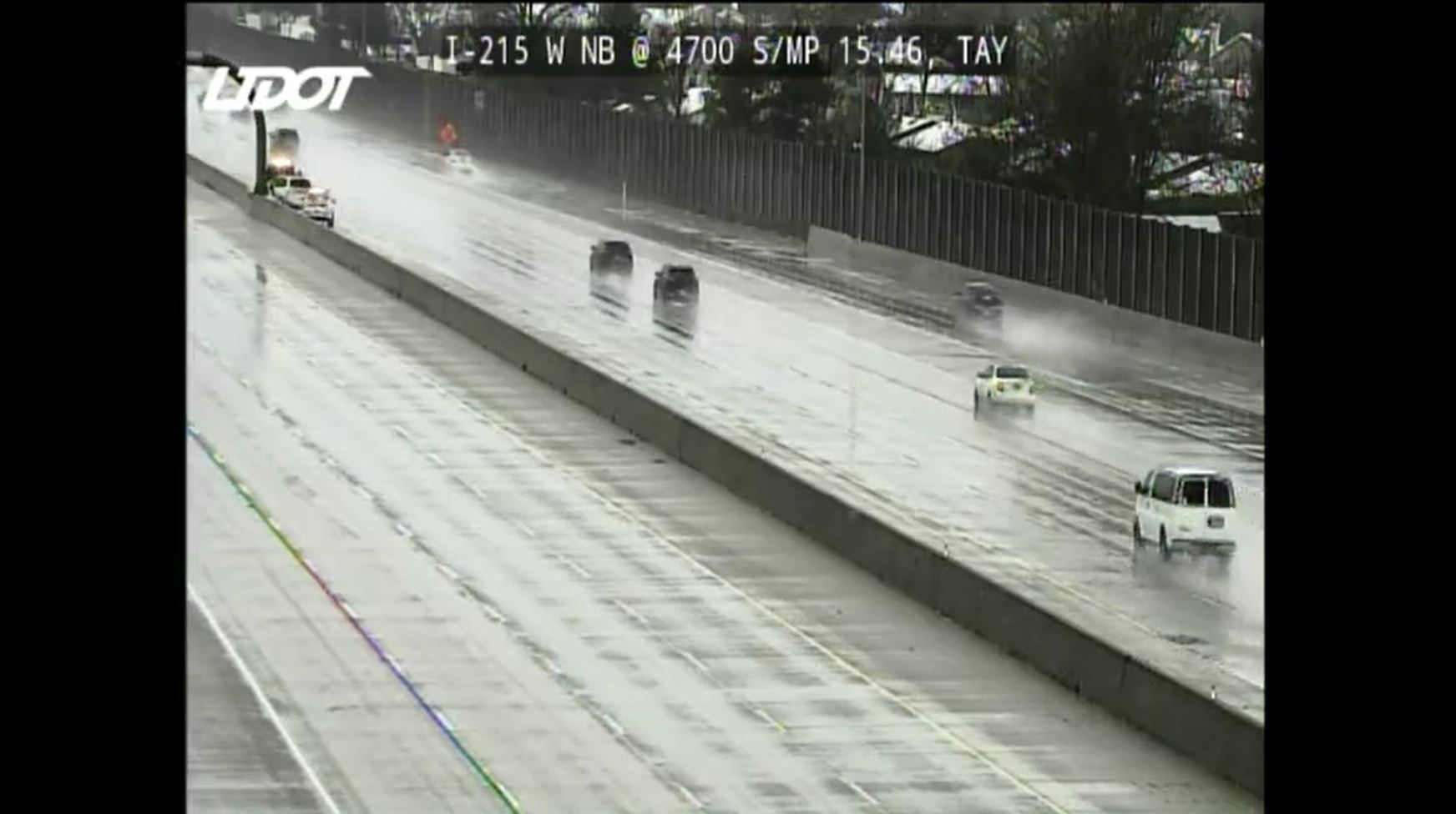 A Utah Department of Transportation camera on Interstate 215 and 4700 South on Sunday. A weather alert will remain active in Salt Lake County through Sunday.