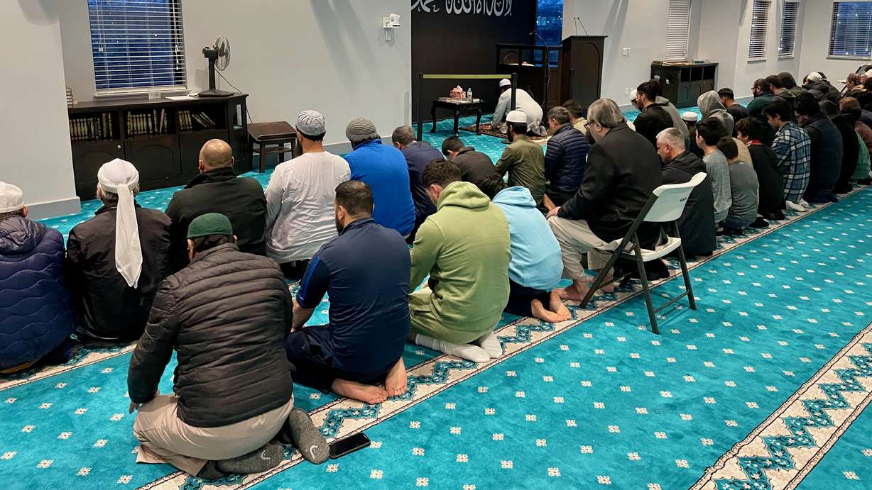 Imam Shuaib Din, at the front in the photo, leads prayer at the Utah Islamic Center in West Jordan on Sunday, March 24, 2024. The Utah Islamic Center hosted an interfaith dinner to break Ramadan on Sunday, March 24, 2024.