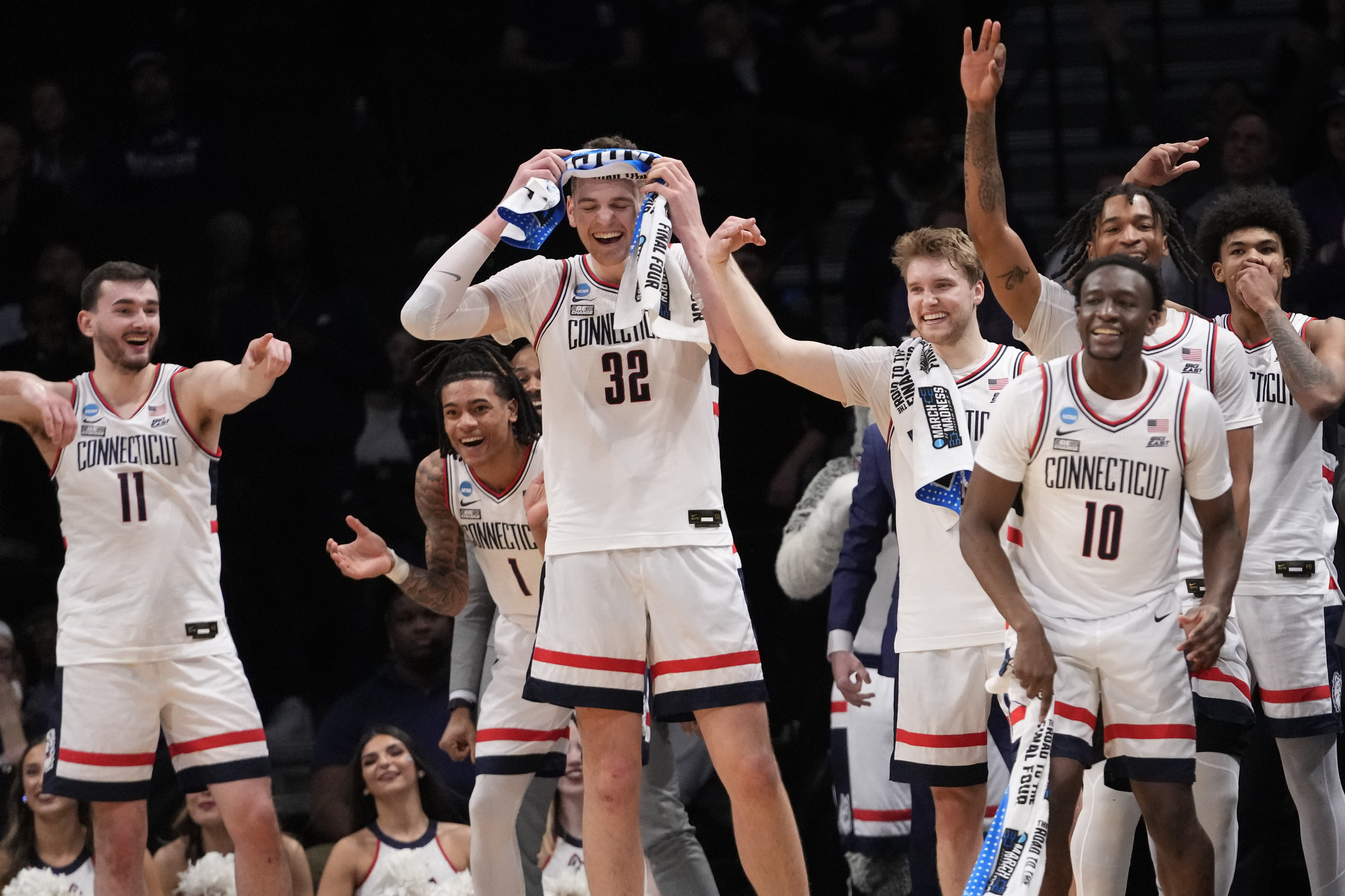 UConn center Donovan Clingan (32) and his teammates reacts in the final seconds of the second half of a second-round college basketball game against Northwestern in the NCAA Tournament, Sunday, March 24, 2024, in New York. UConn won 75-58.