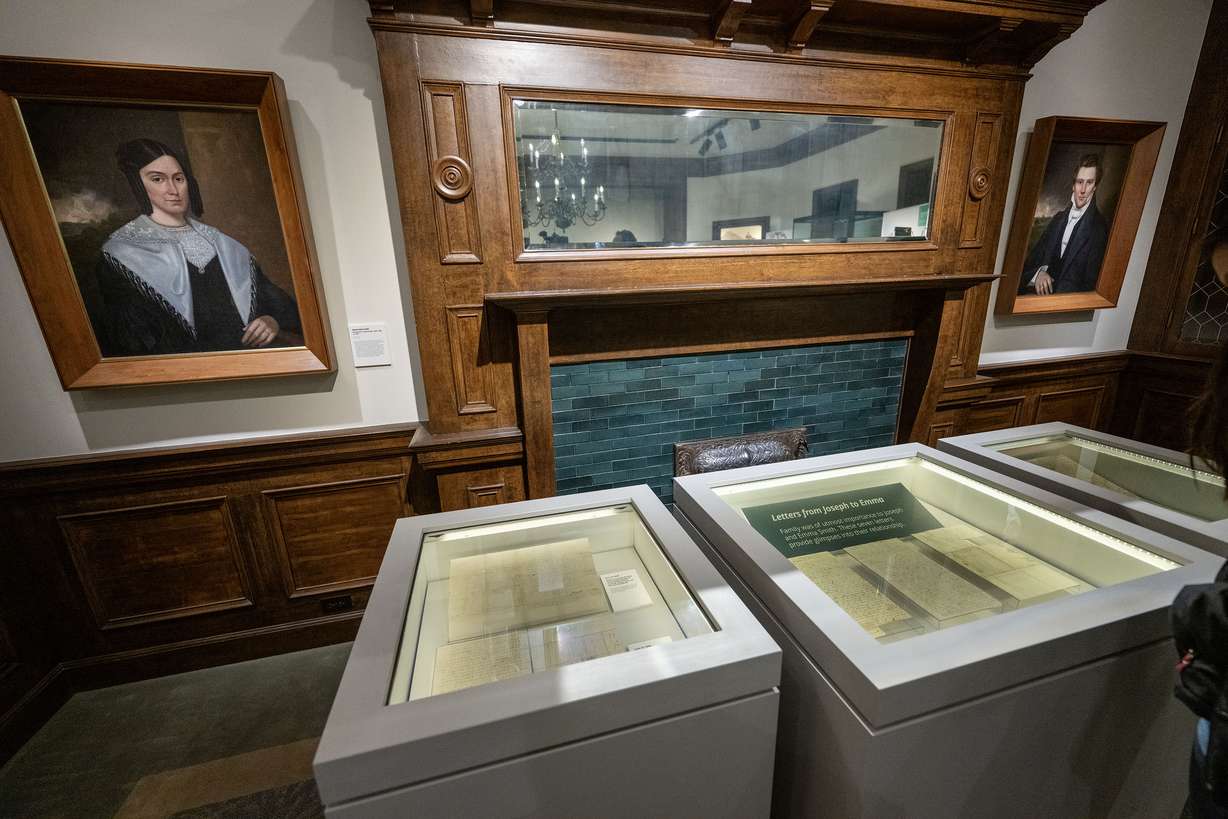Portraits of Emma Hale Smith and Joseph Smith Jr. on display with some of the artifacts newly transferred from the Community of Christ, at the Church History Museum in Salt Lake City on Monday.